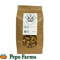 Packaging of Australia Walnut Kernels Chemical Free 700g showing a clear window with walnuts visible inside, and the brand name Pepo Farms at the bottom.