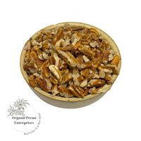 Bowl of Australian grown organic pecans with 'Organic Pecan Enterprises' logo on a white background