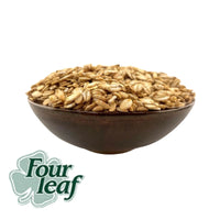 a bowl of Australian grown barley flakes that have been produced by Four leaf milling