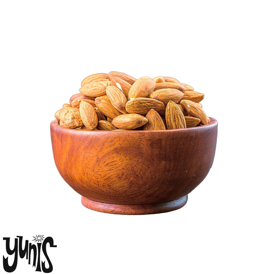 Wooden bowl filled with Australian grown Organic almonds on a white background, featuring the Yunis brand.