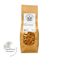 A bag of Australian grown organic pecans with 'Organic Pecan Enterprises' logo on a white background