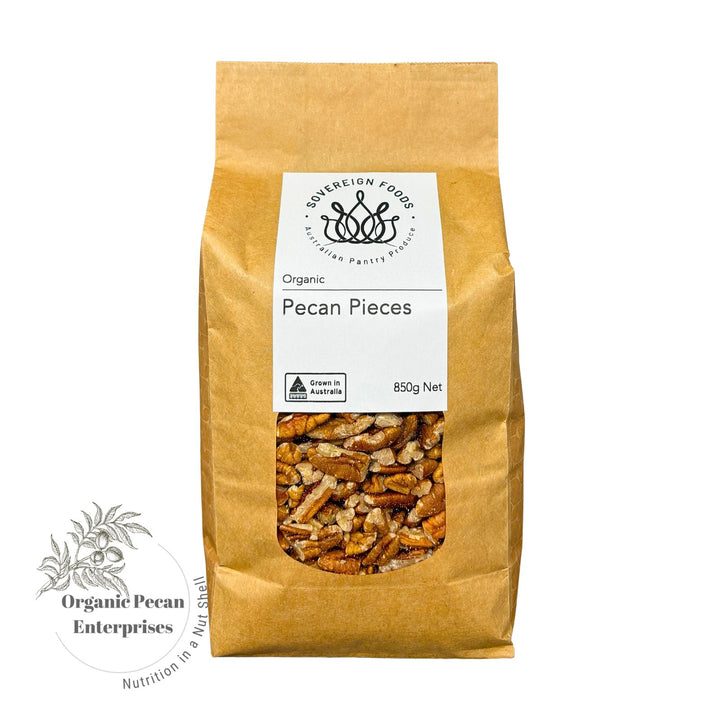 Bowl of Australian grown organic pecans with 'Organic Pecan Enterprises' logo on a white background