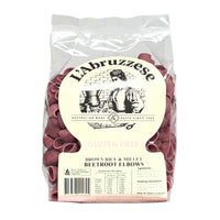 Packaged gluten-free brown rice and millet beetroot elbows pasta with L'Abruzzese branding.