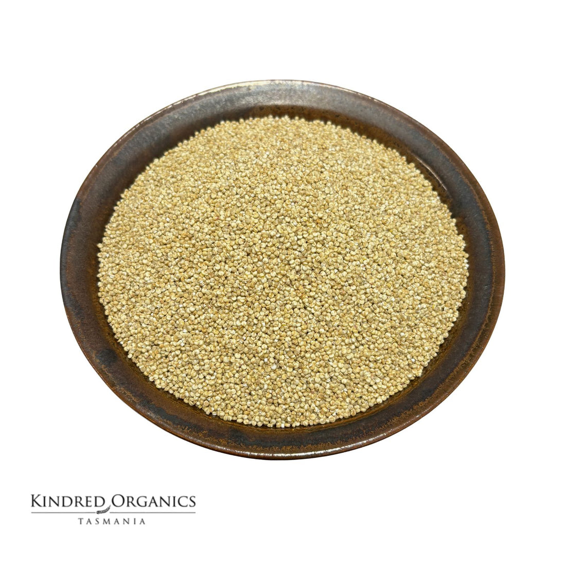 Brown bowl filled with Australian grown organic quinoa on a white background, branded 'Kindred Organics Tasmania'.
