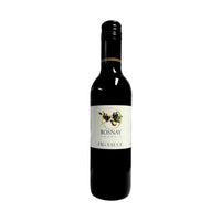 A bottle of Rosnay Organic Fig Sauce with a white label featuring a graphic of a fig and leaves, against a plain background.