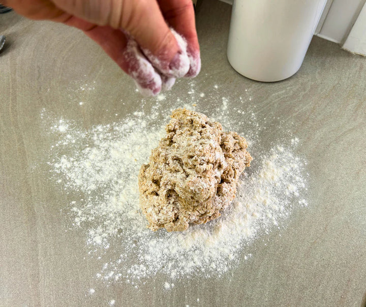Mixed scone dough on a countertop. The dough is made from Freshly milled organic soft wheat grain.  Purple straw is a soft wheat grain that is perfect for cakes, biscuits, cookies and scones