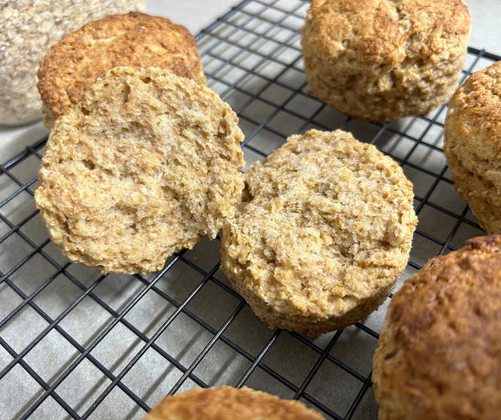 Cut freshly baked scones straight out of the oven. These homemade wholegrain scones were made from freshly milled organic soft wheat grain grown in Australia. The wheat variety was purple straw and it was grown in Western Victoria. Purple straw is a soft wheat grain that is perfect for cakes, biscuits, cookies and scones