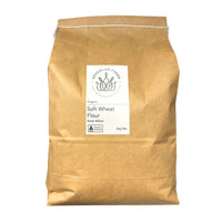 A 5 kg bag of Sovereign Foods Organic Soft Wheat Flour in a brown kraft paper bag with a white label, shown on a plain white background.